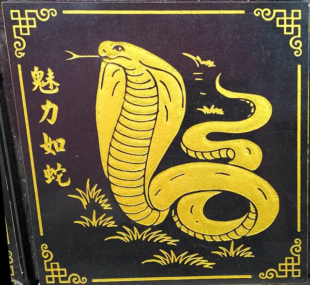 Chinese zodiac stone plaque: snake (gold)