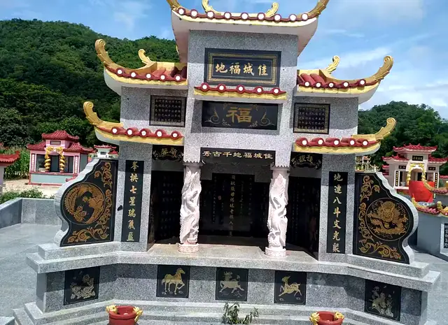 Large granite Chinese tomb with traditional Chinese roofs