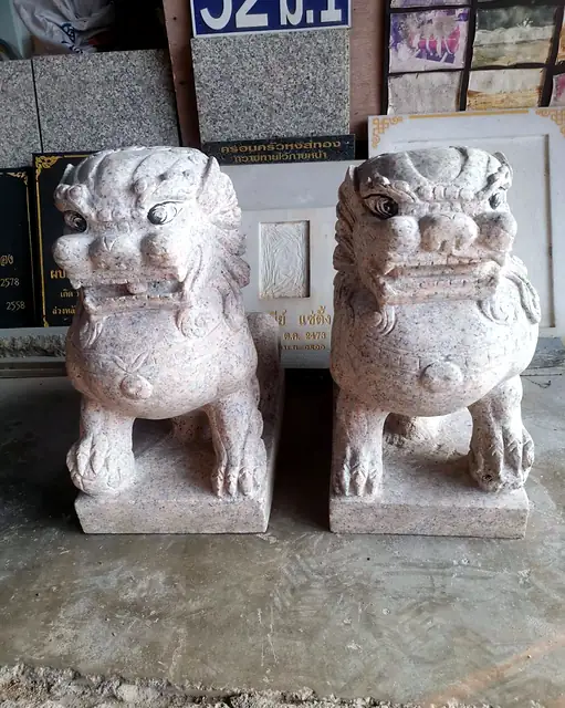 Large pair of white granite lions
