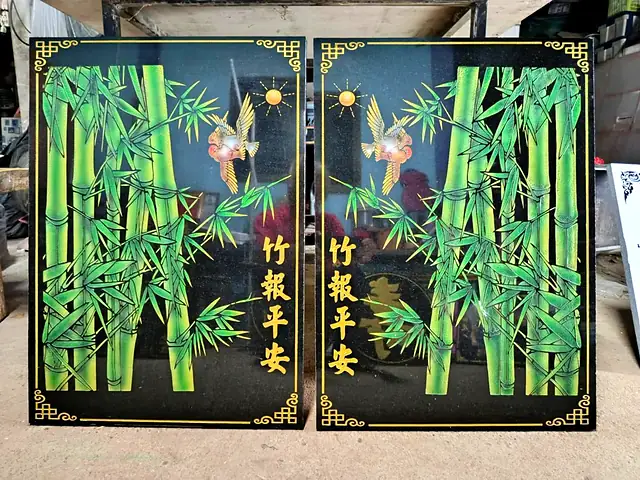 Pair of bamboo painted stone plaques