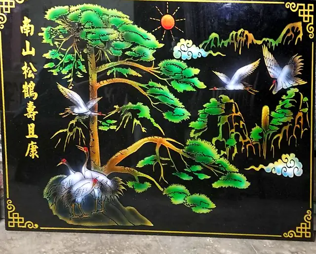 Pine and cranes painted stone plaque