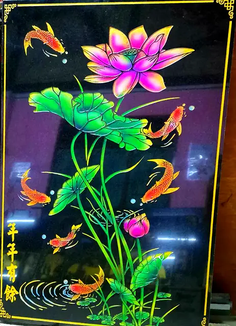 แผ่นหินภาพดอกบัวและปลาคาร์ฟ